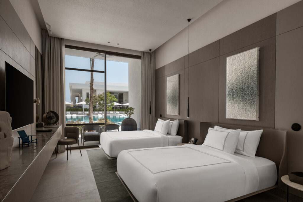 With direct access to the hotel’s crystal-clear pool and a private terrace designed for quiet lounging.