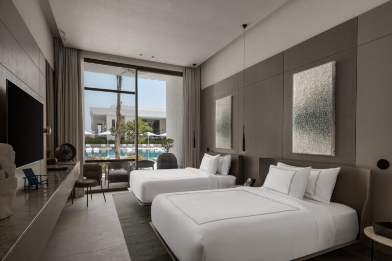 With direct access to the hotel’s crystal-clear pool and a private terrace designed for quiet lounging.