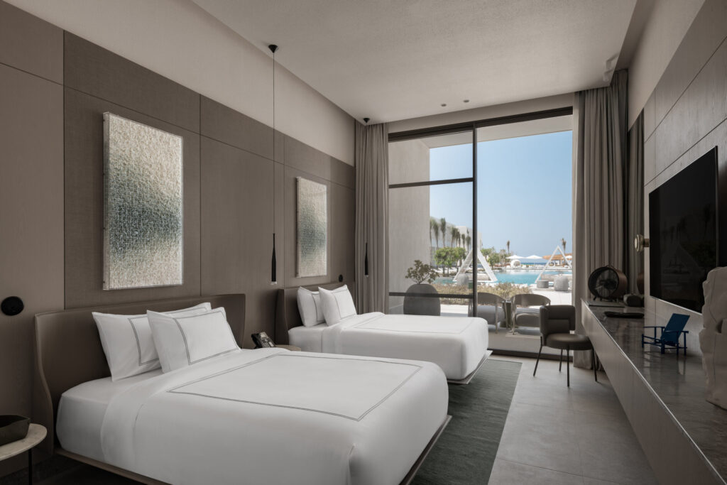 The ground-level positioning provides direct access to the pool.