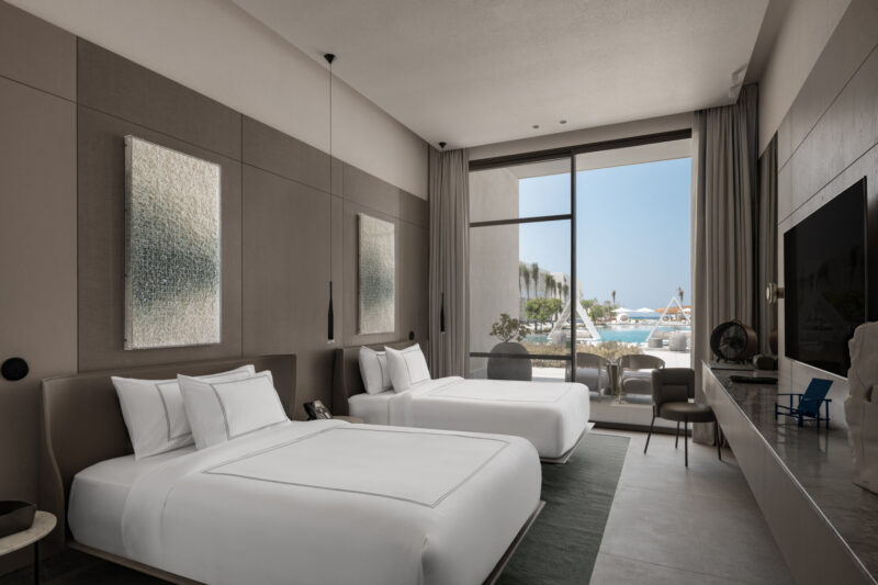 The ground-level positioning provides direct access to the pool.