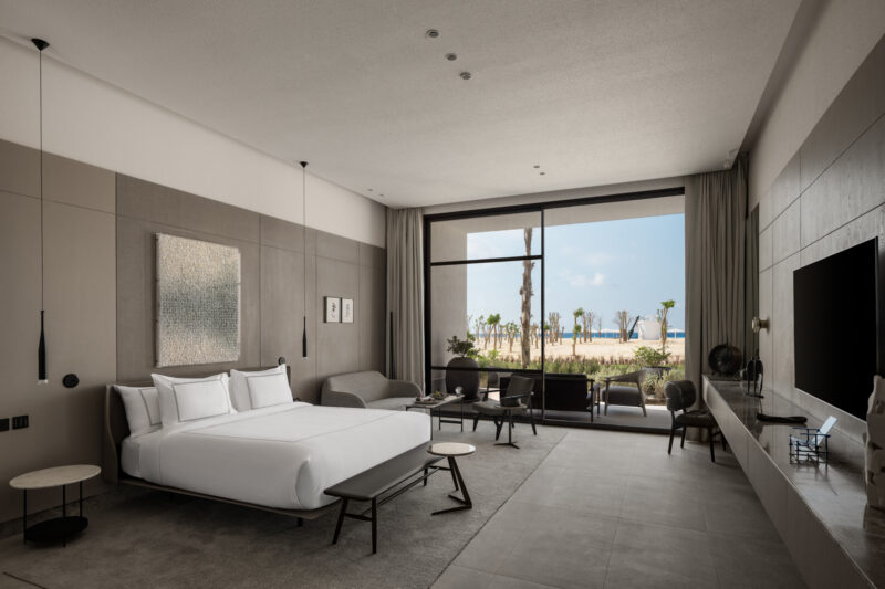 Just beyond, the sea becomes a visual rhythm steady, graceful, and grounding.