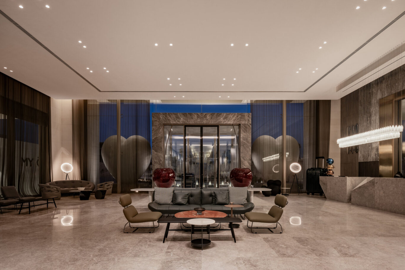 Surfaces, doors, and materials are selected for sound absorption and quiet movement no echoes, no visual clutter.