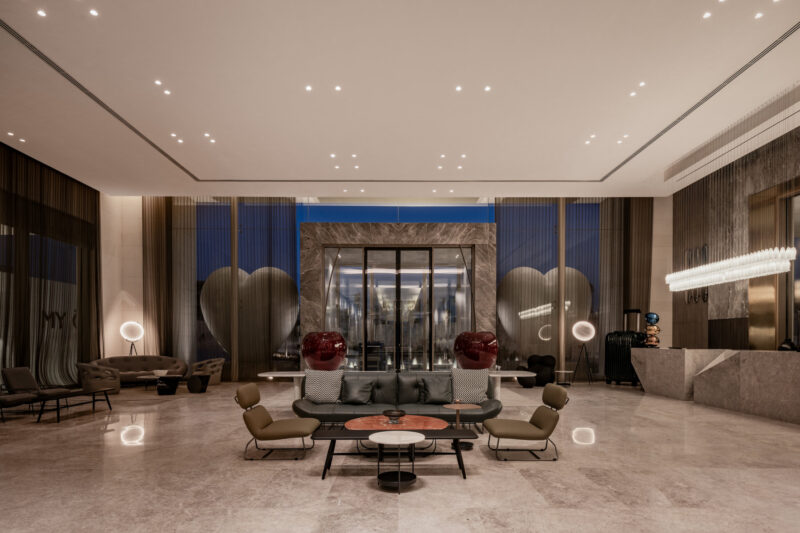 Surfaces, doors, and materials are selected for sound absorption and quiet movement no echoes, no visual clutter.