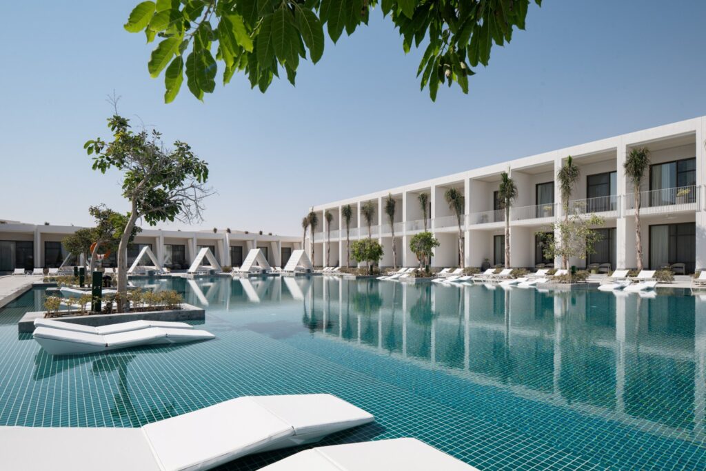 Outdoor areas are designed with indigenous coastal flora to preserve the local ecosystem and enhance natural beauty.