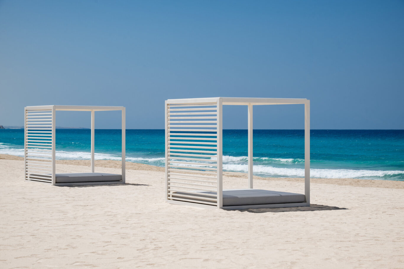 MY ŌTEL set against a stunning stretch of Mediterranean shoreline.